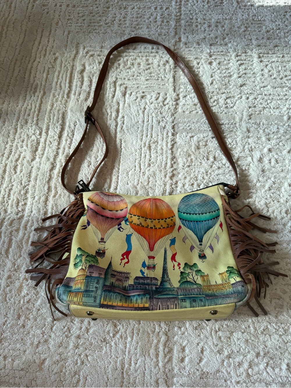 Anuschka Fringe Crossbody Bag with Colorful Hot Air Balloon Print